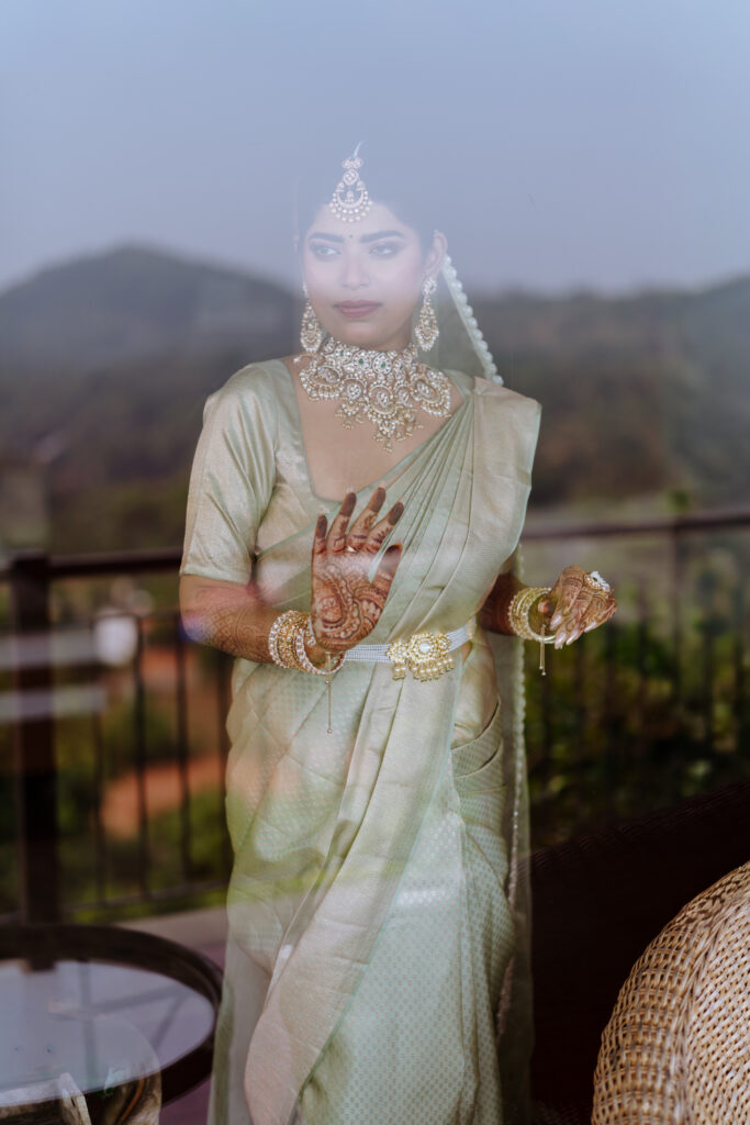 Romantic couple walking at Muzhappilangad Drive-in Beach during their pre-wedding photoshoot Kannur by Fog Media Pro.