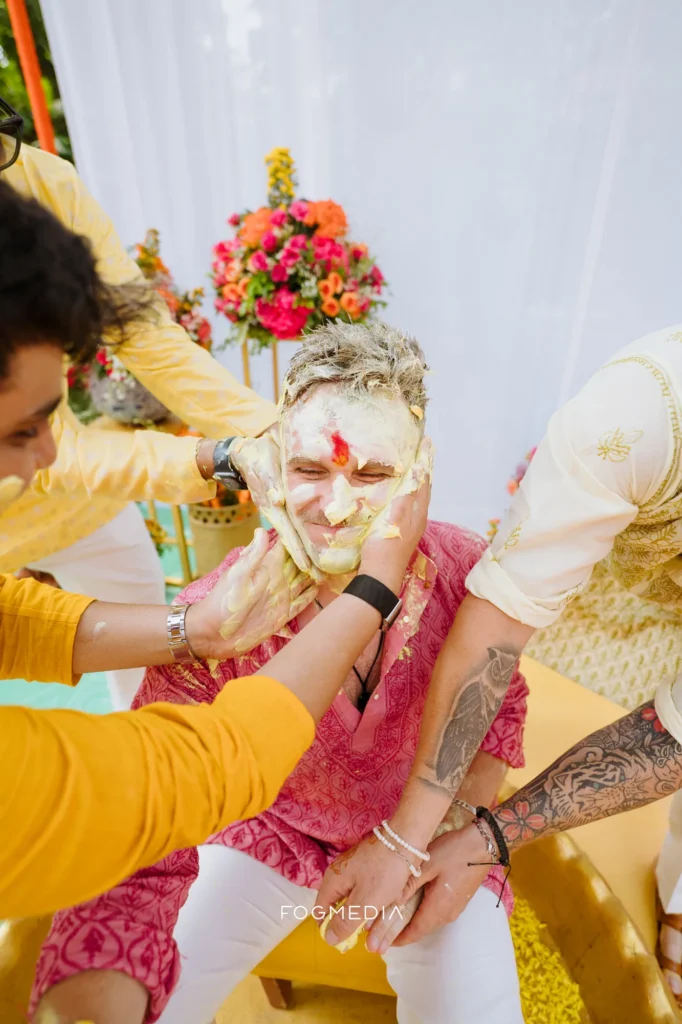 David covered in turmeric paste during the haldi at Prainha Resort, Goa