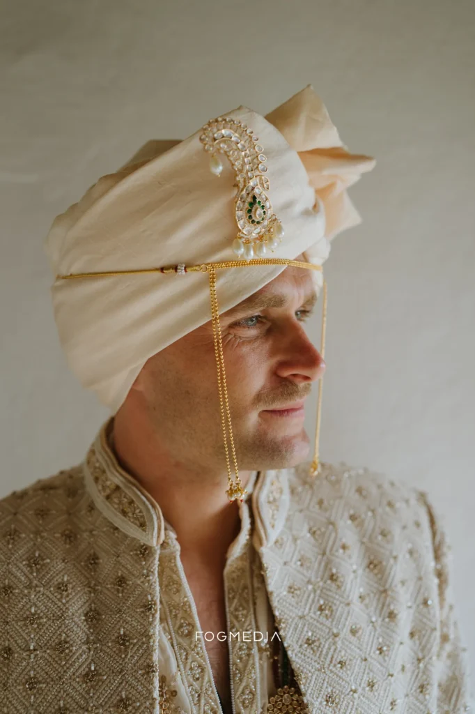 David in an ivory sherwani and turban before the wedding ceremony at Prainha Resort
